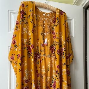 Beautiful kimono style top. Rich gold color.